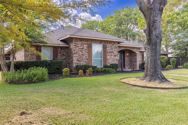 view of front of home with a front yard