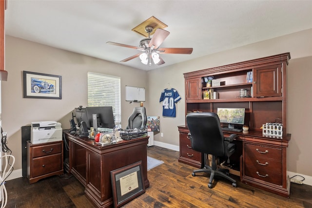 office space featuring baseboards, ceiling fan, and dark wood-style flooring