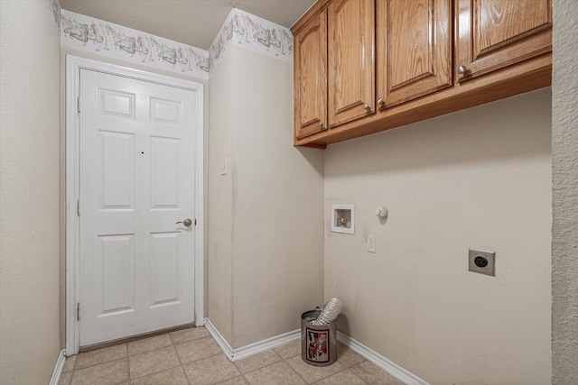 laundry area with hookup for a gas dryer, hookup for a washing machine, electric dryer hookup, and cabinets