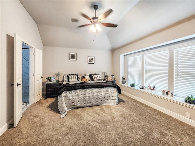 bedroom featuring ceiling fan, lofted ceiling, and carpet floors