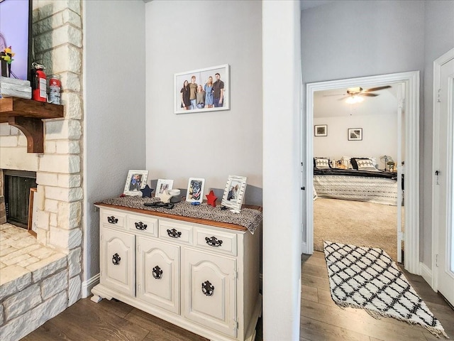 hall with dark hardwood / wood-style floors