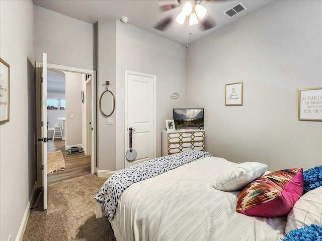 carpeted bedroom with ceiling fan