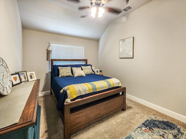 bedroom featuring dark colored carpet, ceiling fan, and lofted ceiling