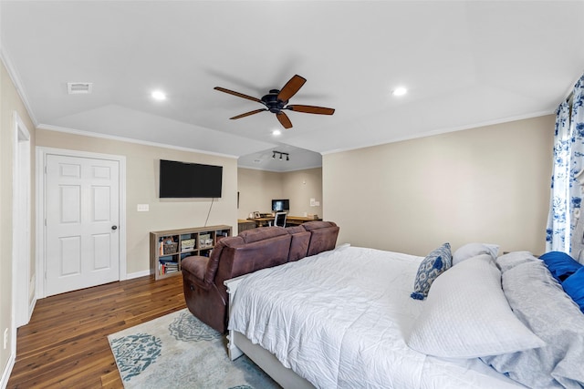 bedroom featuring ceiling fan, ornamental molding, and dark wood-type flooring