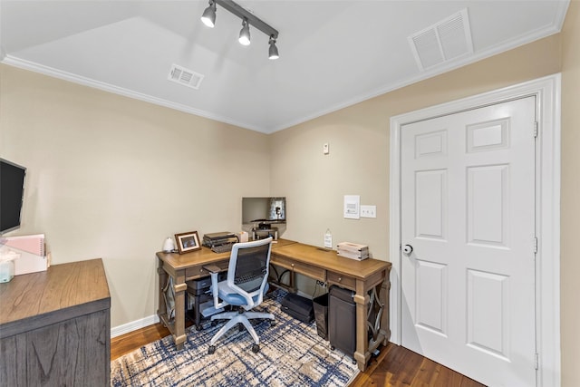 office featuring dark hardwood / wood-style floors, track lighting, and ornamental molding