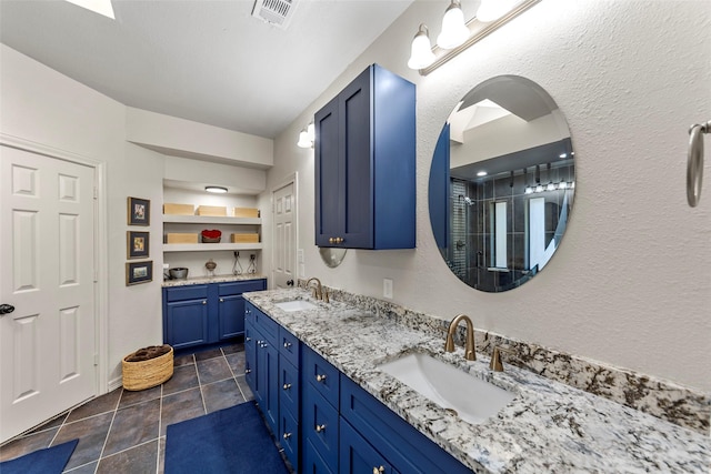 bathroom with vanity and built in features