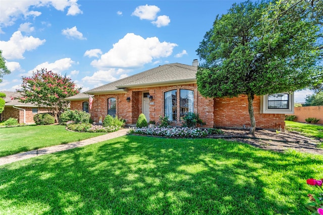 view of front of home with a front yard