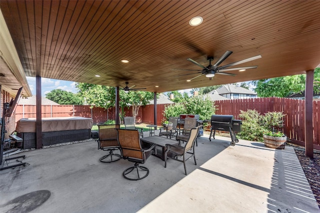 view of patio / terrace with area for grilling and ceiling fan