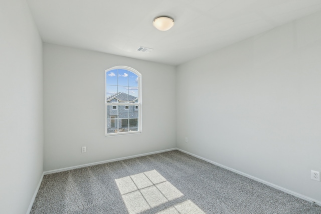 unfurnished room with carpet