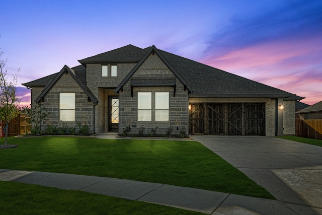 view of front of house with a lawn