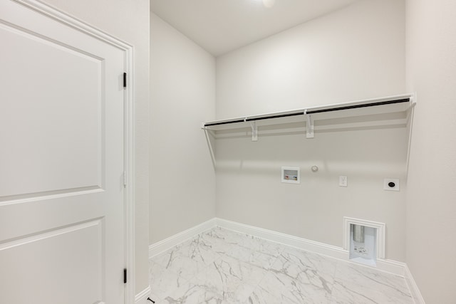 clothes washing area featuring washer hookup, hookup for an electric dryer, and hookup for a gas dryer