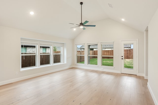 interior space with ceiling fan and lofted ceiling