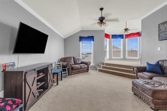 carpeted living area with visible vents, ornamental molding, a ceiling fan, and lofted ceiling