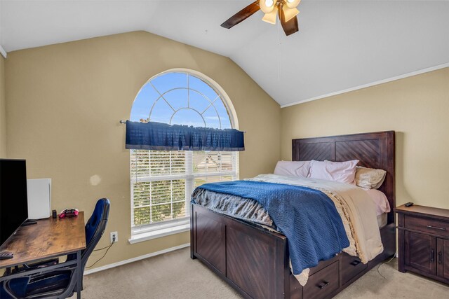 bedroom with ceiling fan, light colored carpet, baseboards, and lofted ceiling