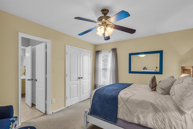 bedroom with ceiling fan and light colored carpet