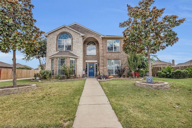 view of front of property with a front lawn