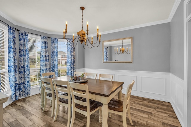 1114 Alexander Ct, Midlothian, TX 76065 - dining room with a chandelier, wood finished floors, ornamental molding, and wainscoting