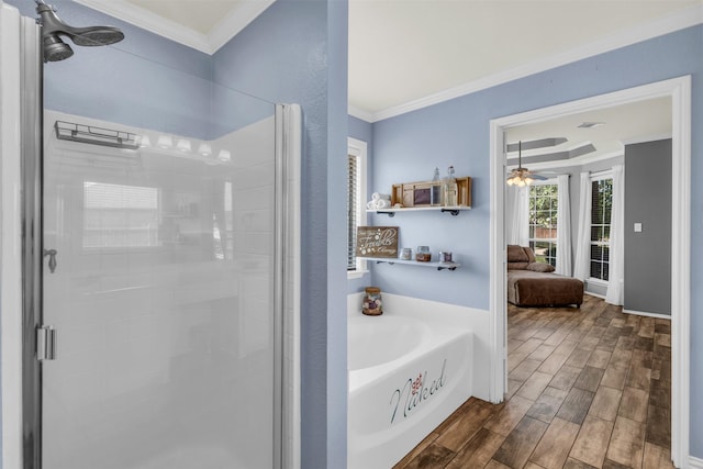 bathroom with shower with separate bathtub, ceiling fan, and ornamental molding