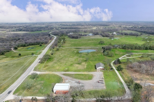 birds eye view of property featuring a rural view