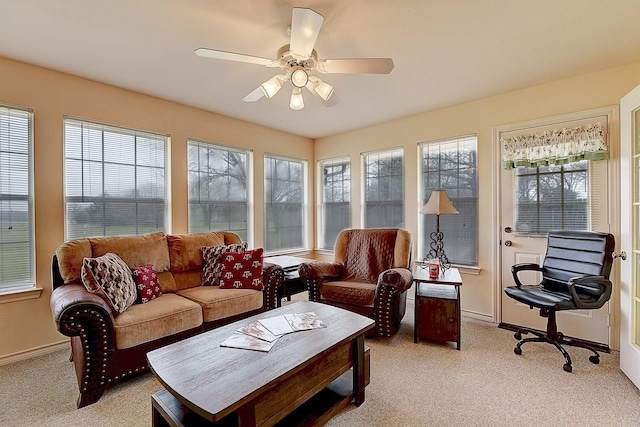 sunroom / solarium with ceiling fan