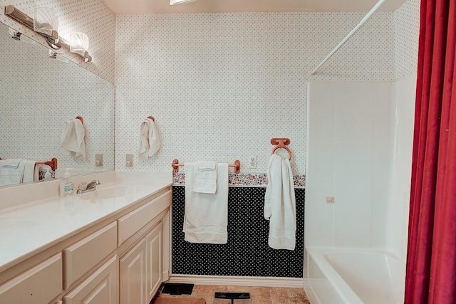 bathroom featuring tile patterned floors and vanity