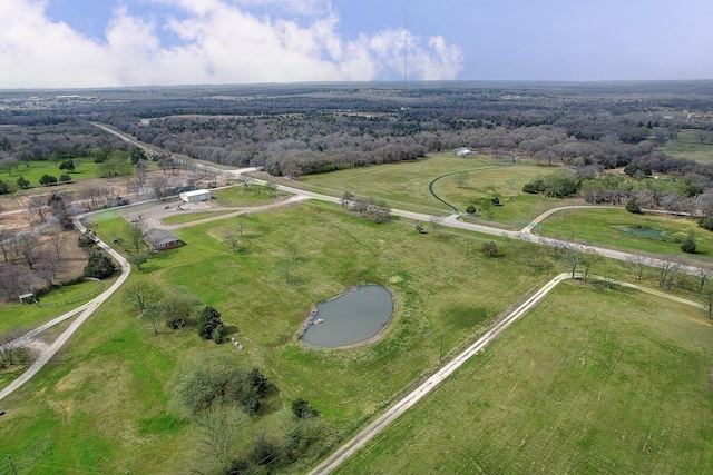 aerial view with a rural view and a water view