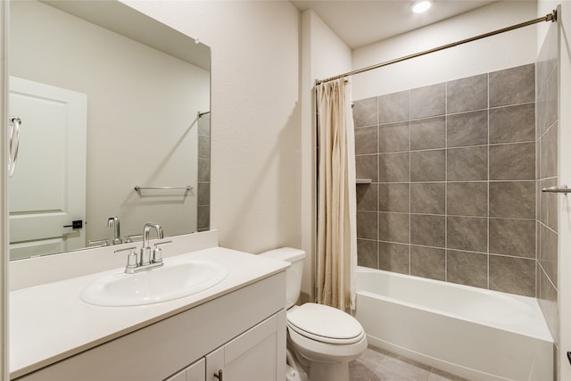 full bathroom featuring tile patterned floors, vanity, toilet, and shower / bathtub combination with curtain