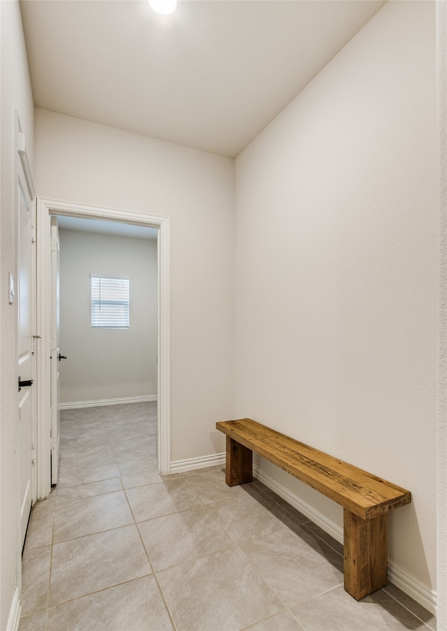 mudroom with light tile patterned flooring