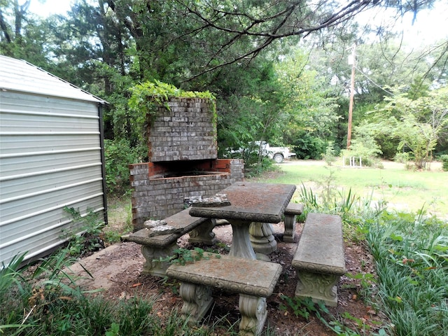 exterior space featuring a fireplace