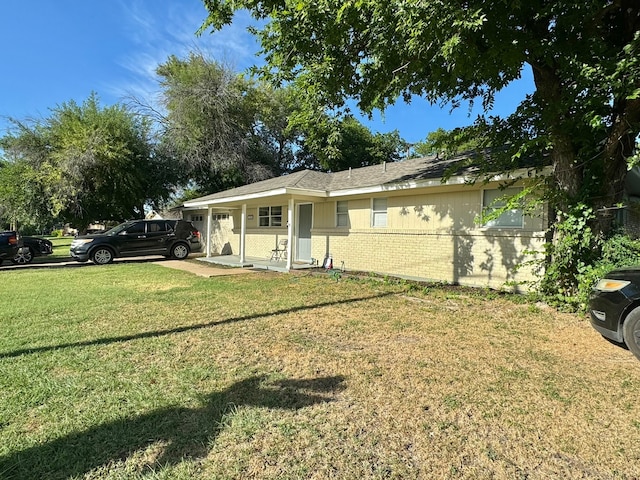 exterior space with a lawn