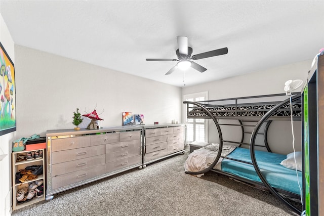 bedroom featuring ceiling fan and carpet flooring