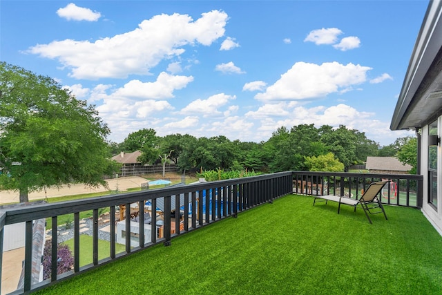 view of yard featuring a balcony