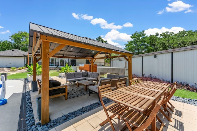 view of patio / terrace with a gazebo and an outdoor hangout area