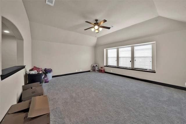 interior space featuring carpet floors, ceiling fan, and lofted ceiling