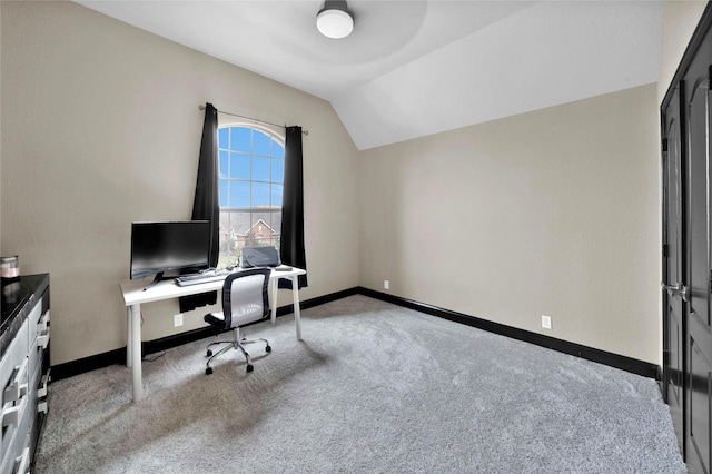 office area with light colored carpet and lofted ceiling