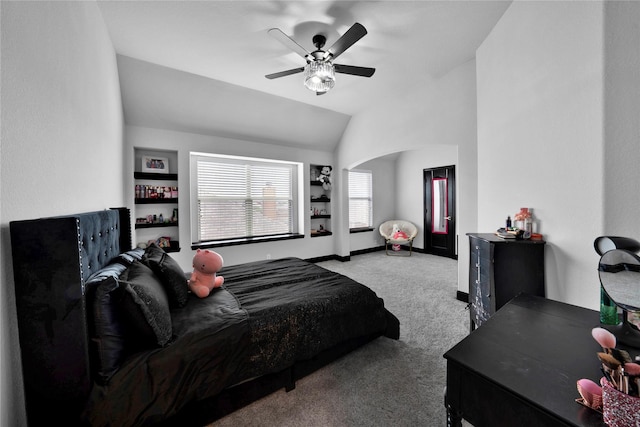 bedroom with ceiling fan, carpet, and vaulted ceiling