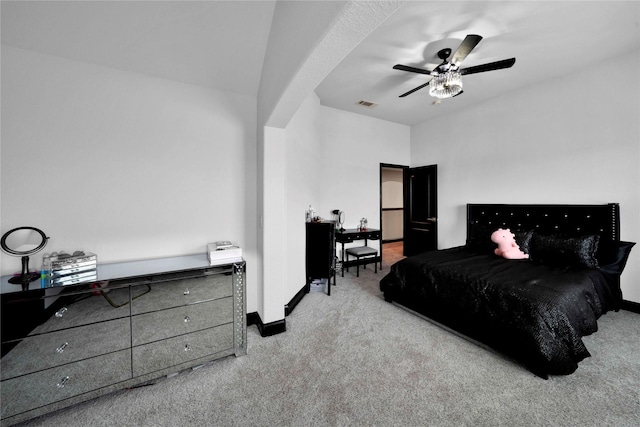 bedroom with ceiling fan and light colored carpet