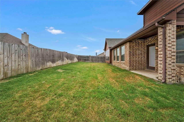 view of yard with a patio area