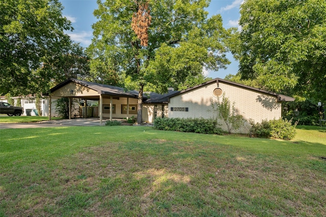 ranch-style house with a front yard