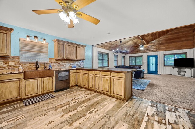 kitchen with ceiling fan with notable chandelier, wooden walls, hanging light fixtures, light wood-type flooring, and wooden ceiling