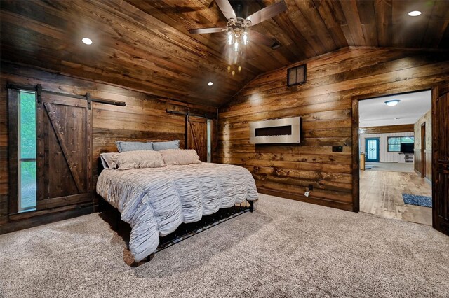 carpeted bedroom featuring ceiling fan, vaulted ceiling, wooden walls, french doors, and wooden ceiling