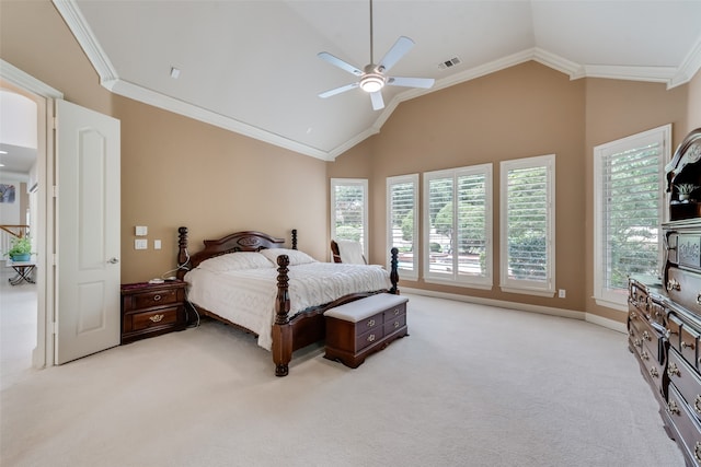 bedroom with ceiling fan, light colored carpet, lofted ceiling, and ornamental molding