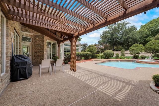 view of swimming pool featuring a grill, a pergola, an in ground hot tub, and a patio