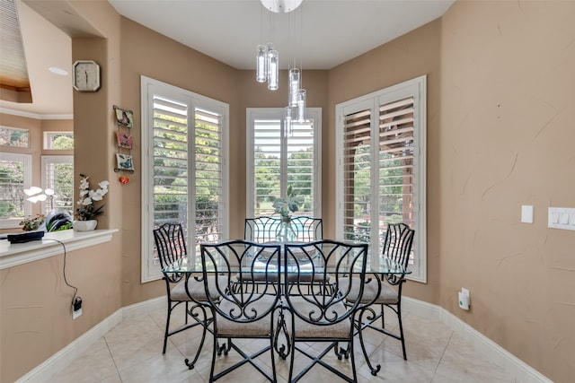 tiled dining space with ornamental molding