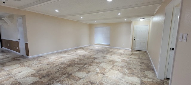 tiled spare room with ornamental molding