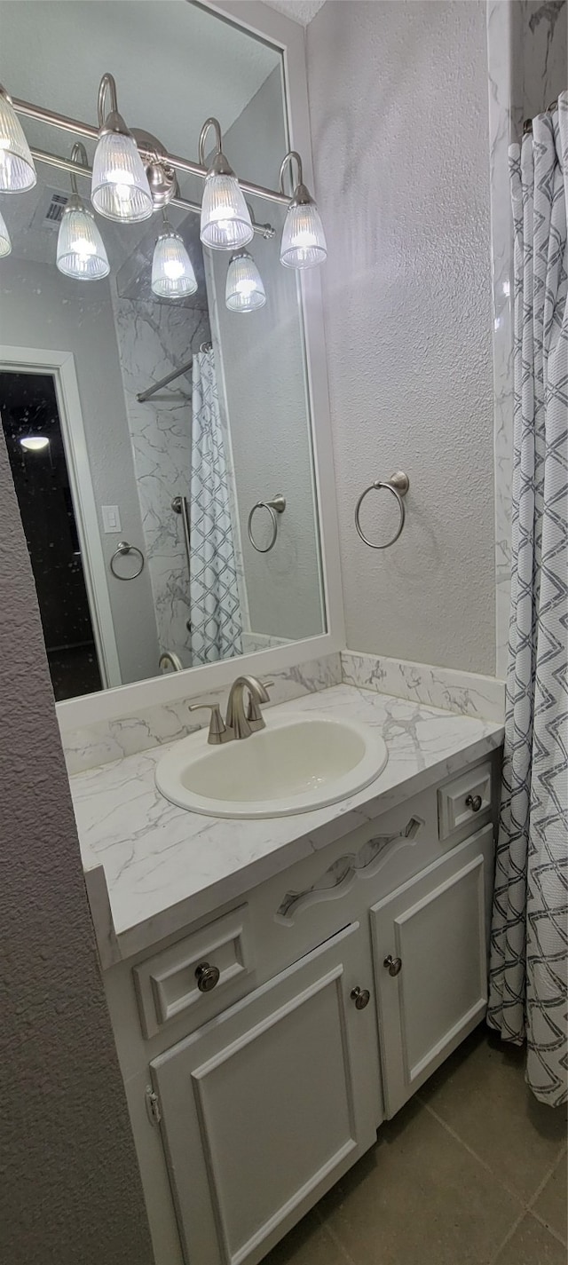 bathroom featuring vanity and tile patterned floors