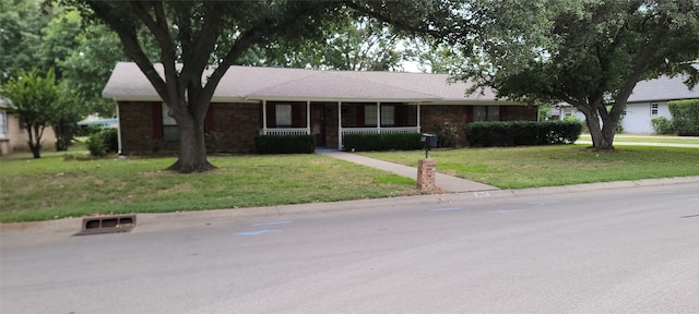 ranch-style house with a front yard