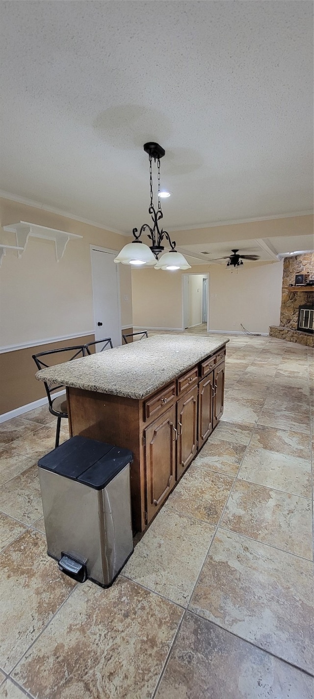 interior space featuring a textured ceiling and ceiling fan