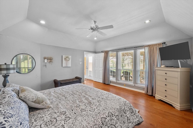 bedroom with ceiling fan and light hardwood / wood-style flooring