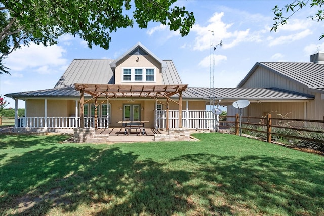 back of house with a patio area, a yard, and a pergola